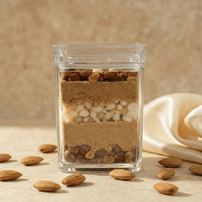 Deconstructed gond badam laddoo in a jar